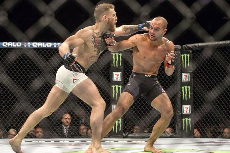 کانر مکگرگور و آدی آلوارز قهرمانی دوگانه در UFC 205